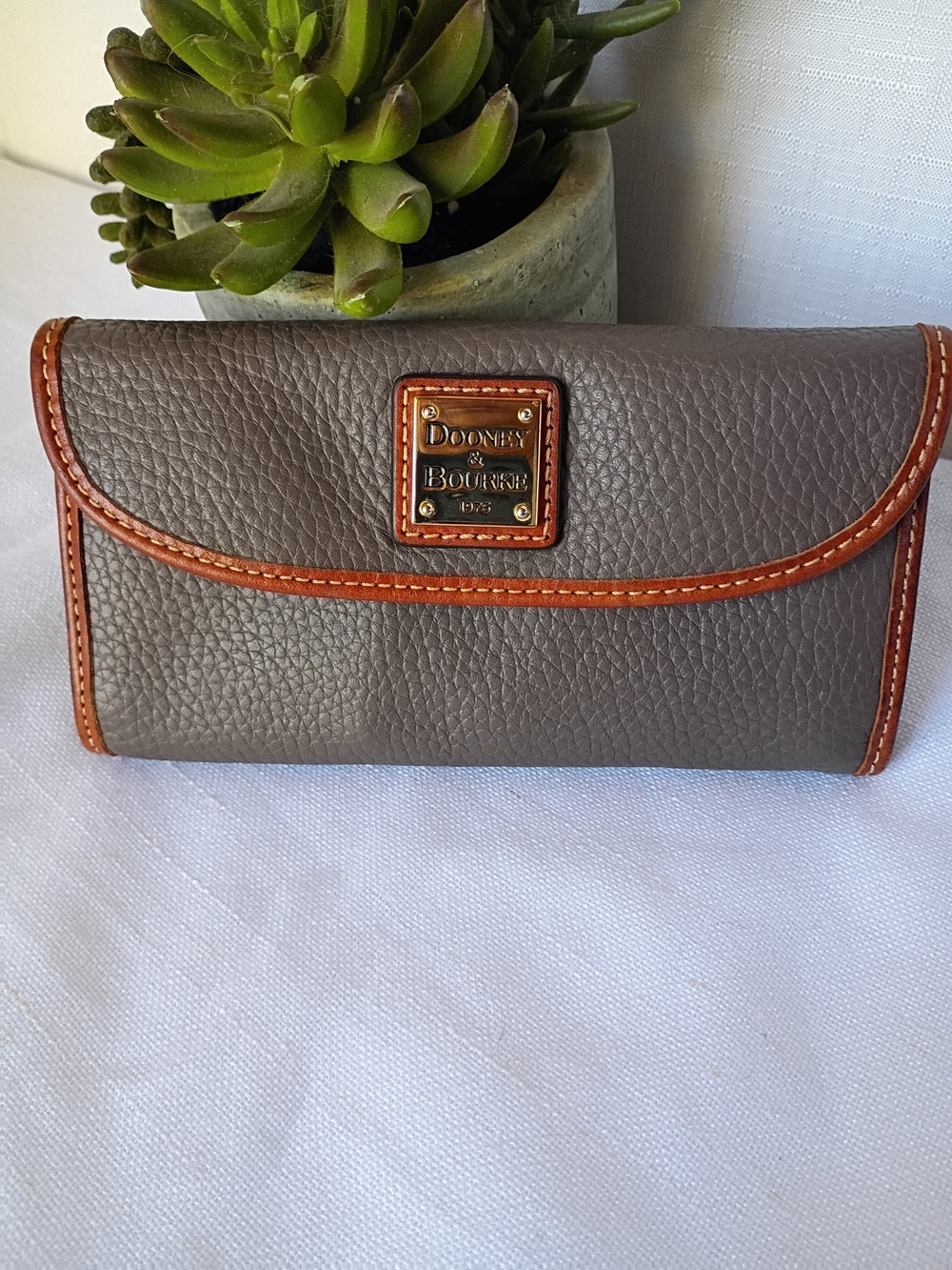 Dooney & Bourke Gray Pebbled Leather Wallet with Brown Trim